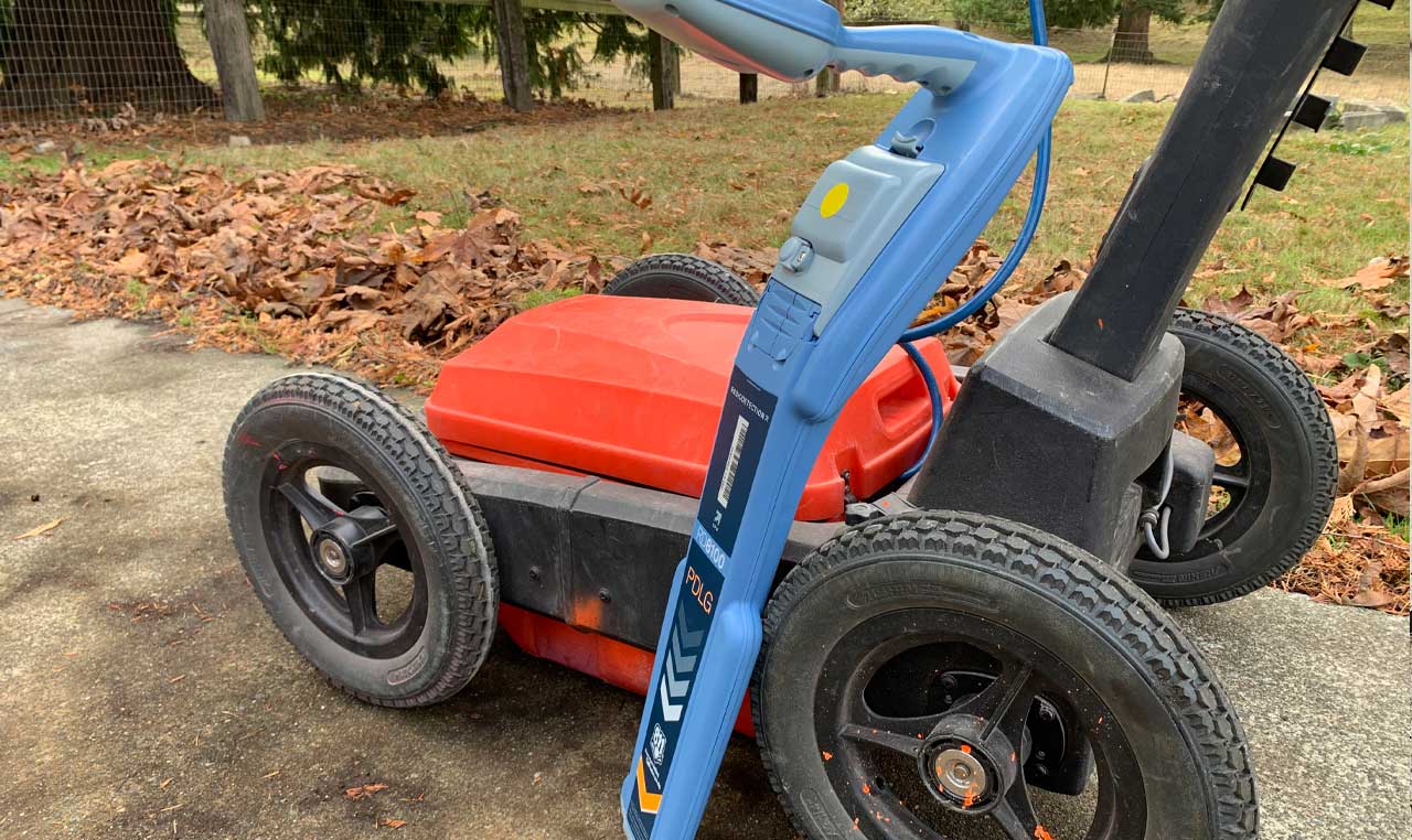 RainierGPR technician locating underground utilities with ground penetrating radar